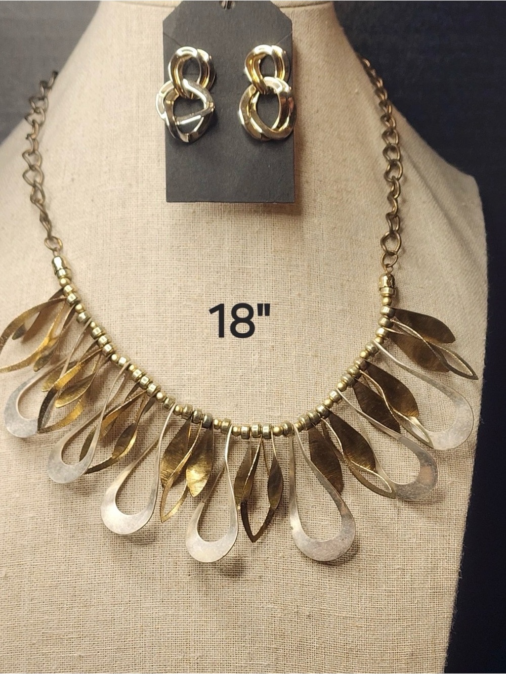 81. Gold-Tone Teardrop Statement Necklace and Earring Set